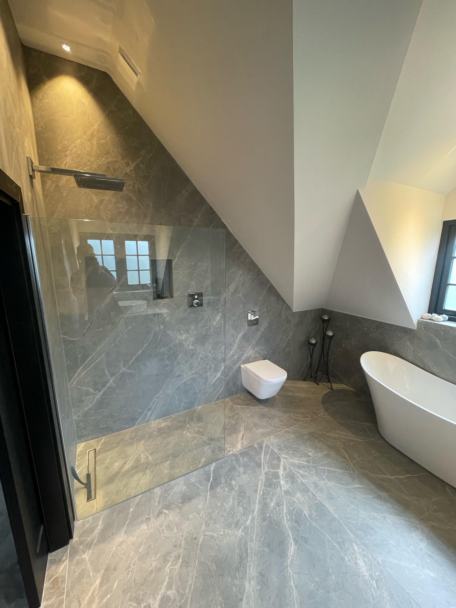 A marble en-suite fitted by Sevenoaks Plumbing & Heating